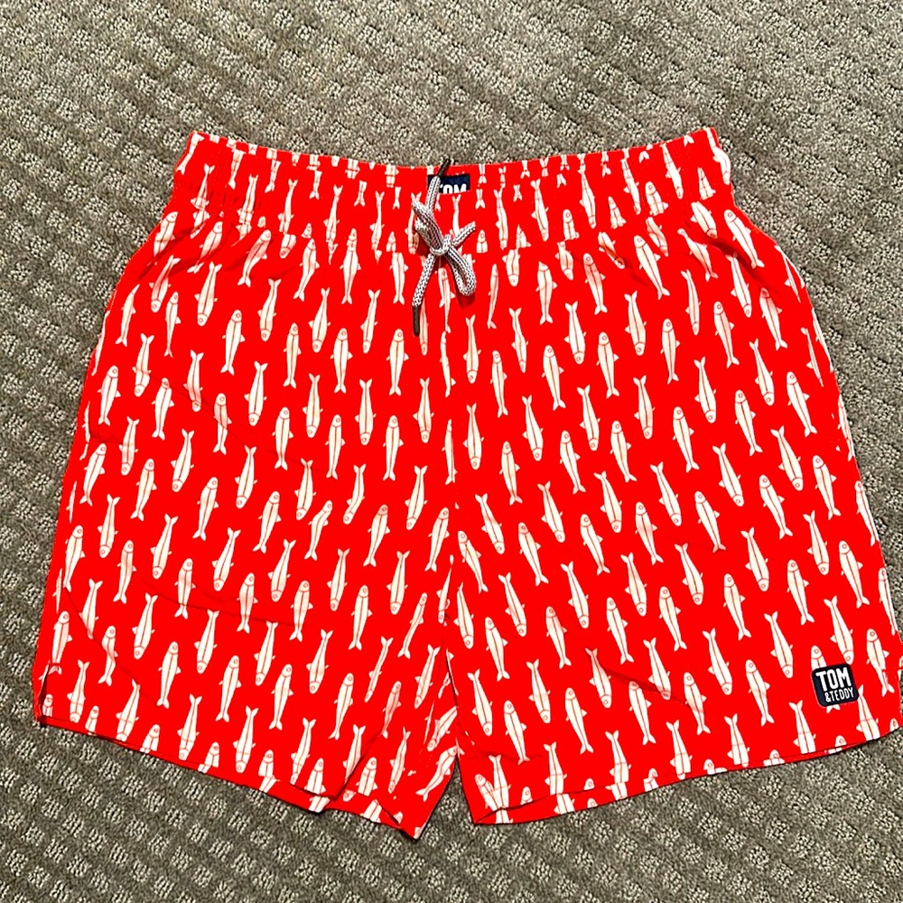 Tom and Teddy size medium swim shorts with inner liner. New with tags.